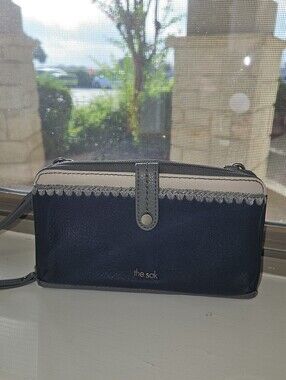 The Sak Zip Around Leather Wallet Crossbody.